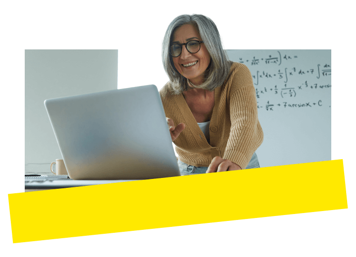 An educator teaching her student virtually via laptop using GoTo Connect.